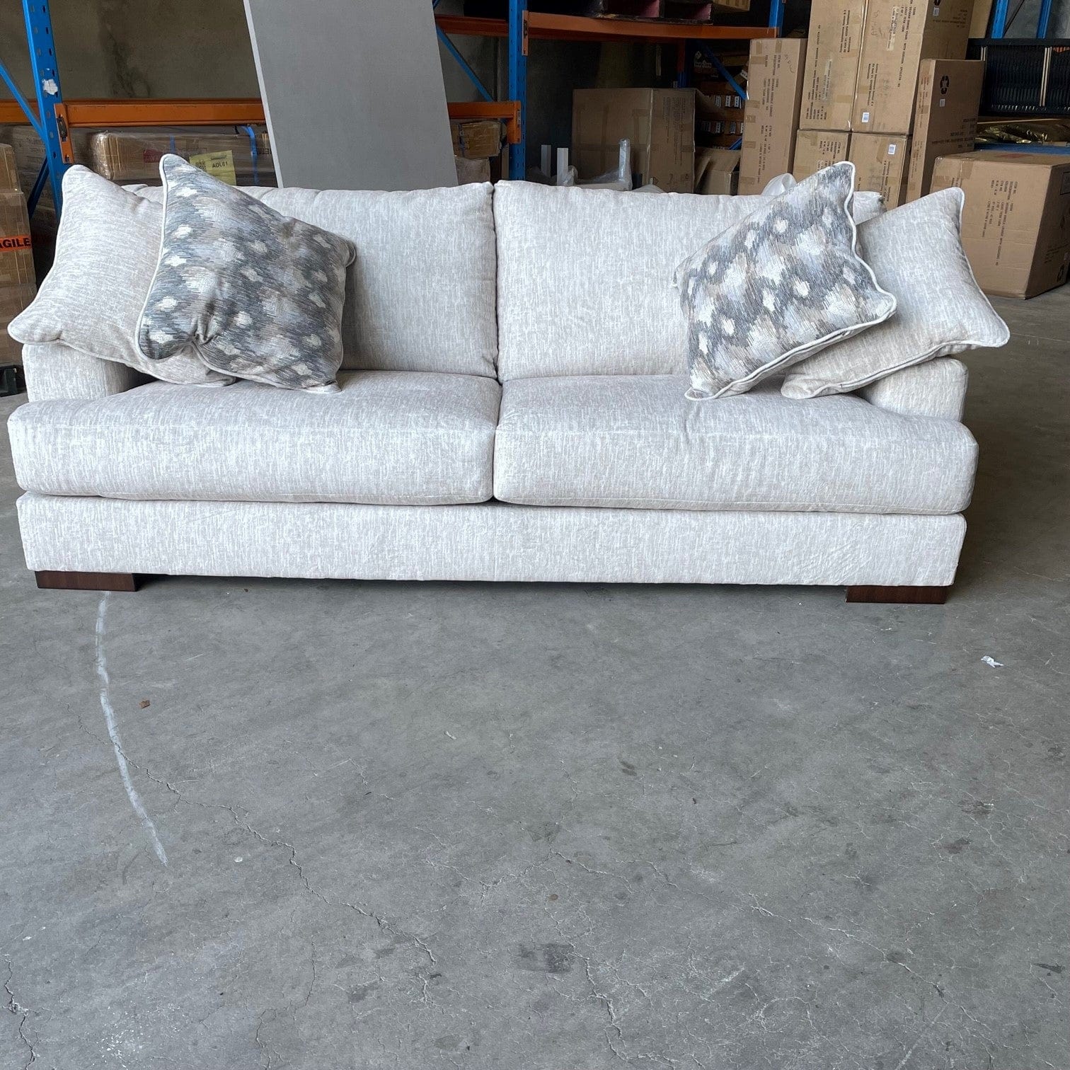 Caretti 3 seat 2 seat sofa and Ottoman — Australian Furniture Warehouse